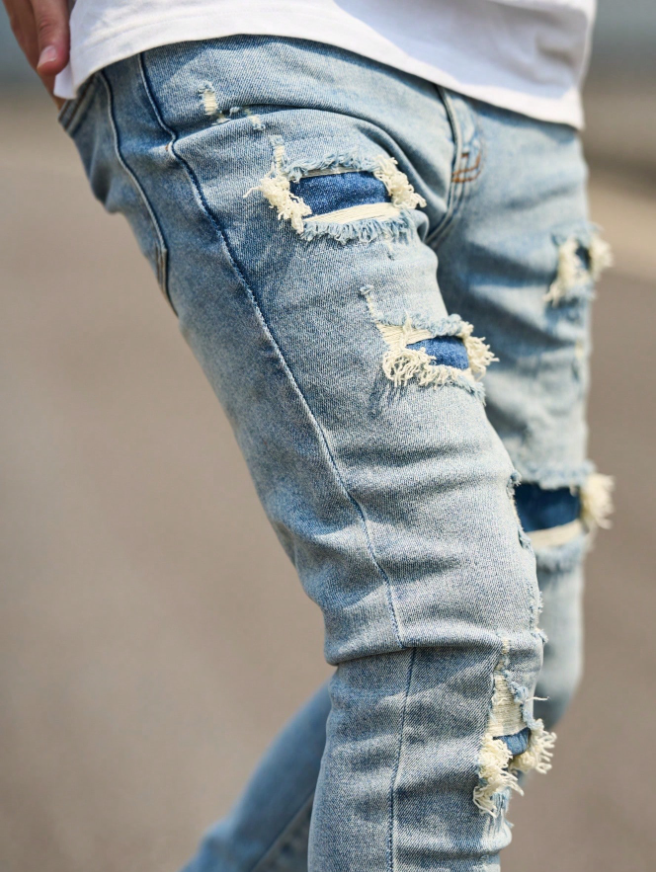 Men's Light Wash Ripped Skinny Jeans With Dark Denim Patches, view 3