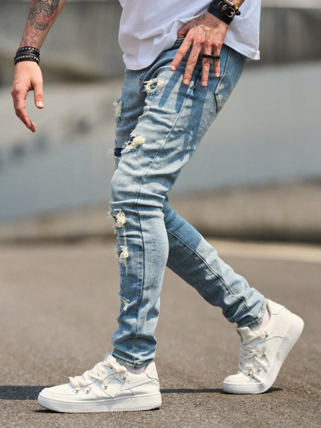 Men's Light Wash Ripped Skinny Jeans With Dark Denim Patches, view 5