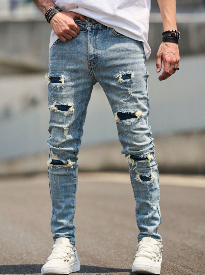 Men's Light Wash Ripped Skinny Jeans With Dark Denim Patches
