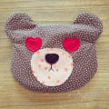 Woollypetals Bear Pouch with red heart eyes and black nose on polka dot fabric