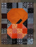 Woollypetals Ghost Party Pumpkin Expansion Pack quilt with orange and black fabric blocks