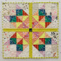 Woollypetals Starfy Mini quilt with colorful sawtooth star design