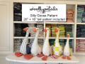 Woollypetals Silly Goose Pattern stuffed geese in various fabric prints displayed on shelf