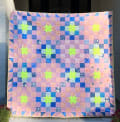 Woollypetals New Star quilt pattern with yellow stars and blue blocks
