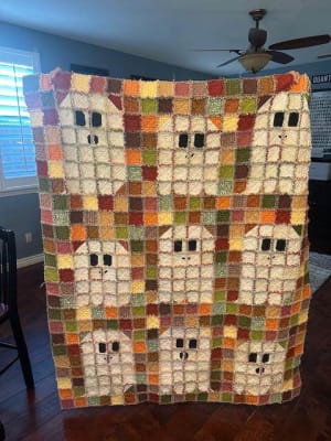 Woollypetals Ghost Party quilt with colorful patchwork and ghost blocks