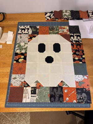 Woollypetals Ghost Party quilt with three ghost blocks in Halloween fabrics