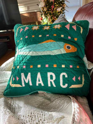 Woollypetals Sardine Tin FPP pillow in green with orange fish and decorative bunting