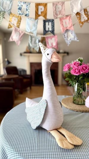 Woollypetals Silly Goose stuffed fabric goose with party banner