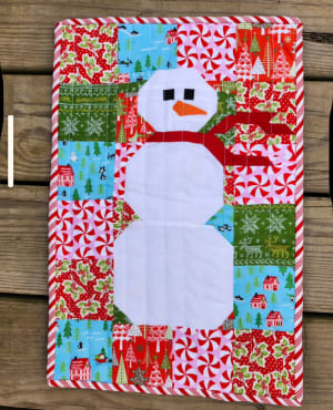 Woollypetals Do You Want to Sew a Snowman quilt with festive patchwork border
