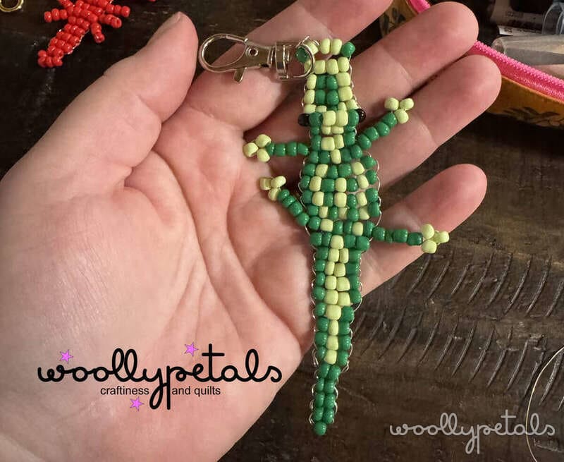 Beaded Sardine Charm in green and cream beads with metal clasp