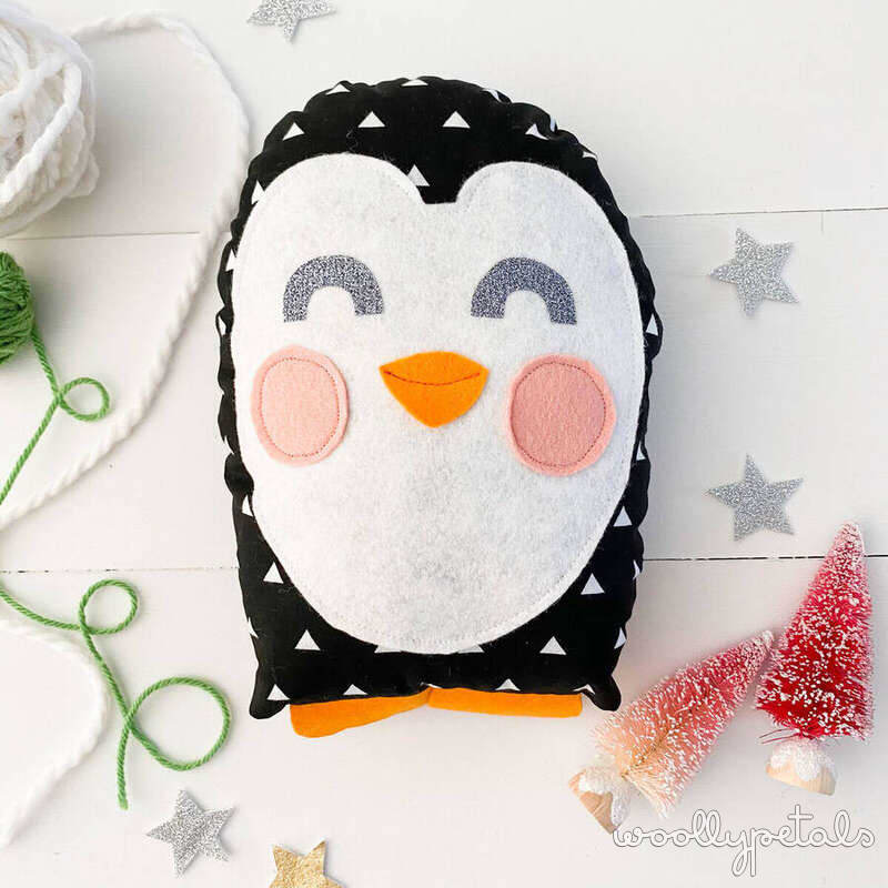 Silly Goose pattern penguin pincushion with white face and black body