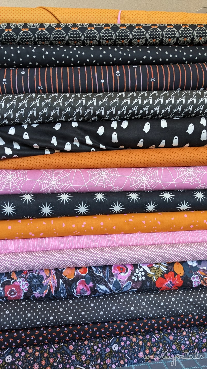 Ghost Party quilt fabric bundle in Halloween colors including orange, black, pink, and white prints