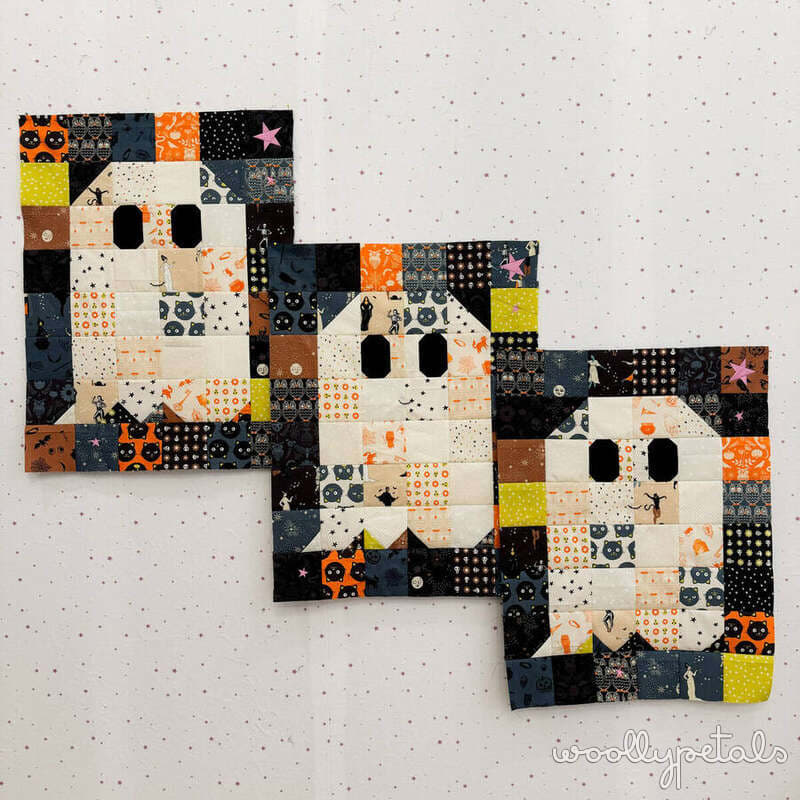 Woollypetals Ghost Party quilt with three ghost blocks in Halloween fabrics