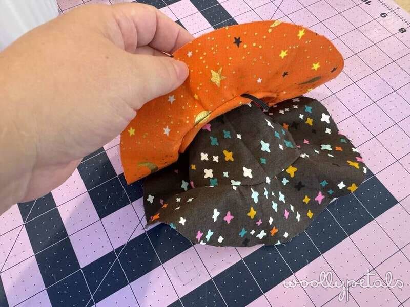 Woollypetals Silly Goose Witch Hat Tutorial showing orange and black fabric hats with star details