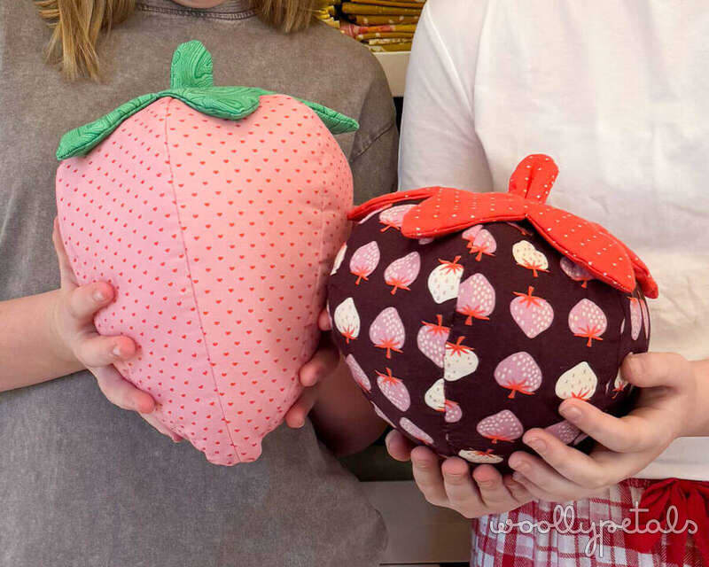 Woollypetals Strawberry Pillow Pattern in pink and dark red versions