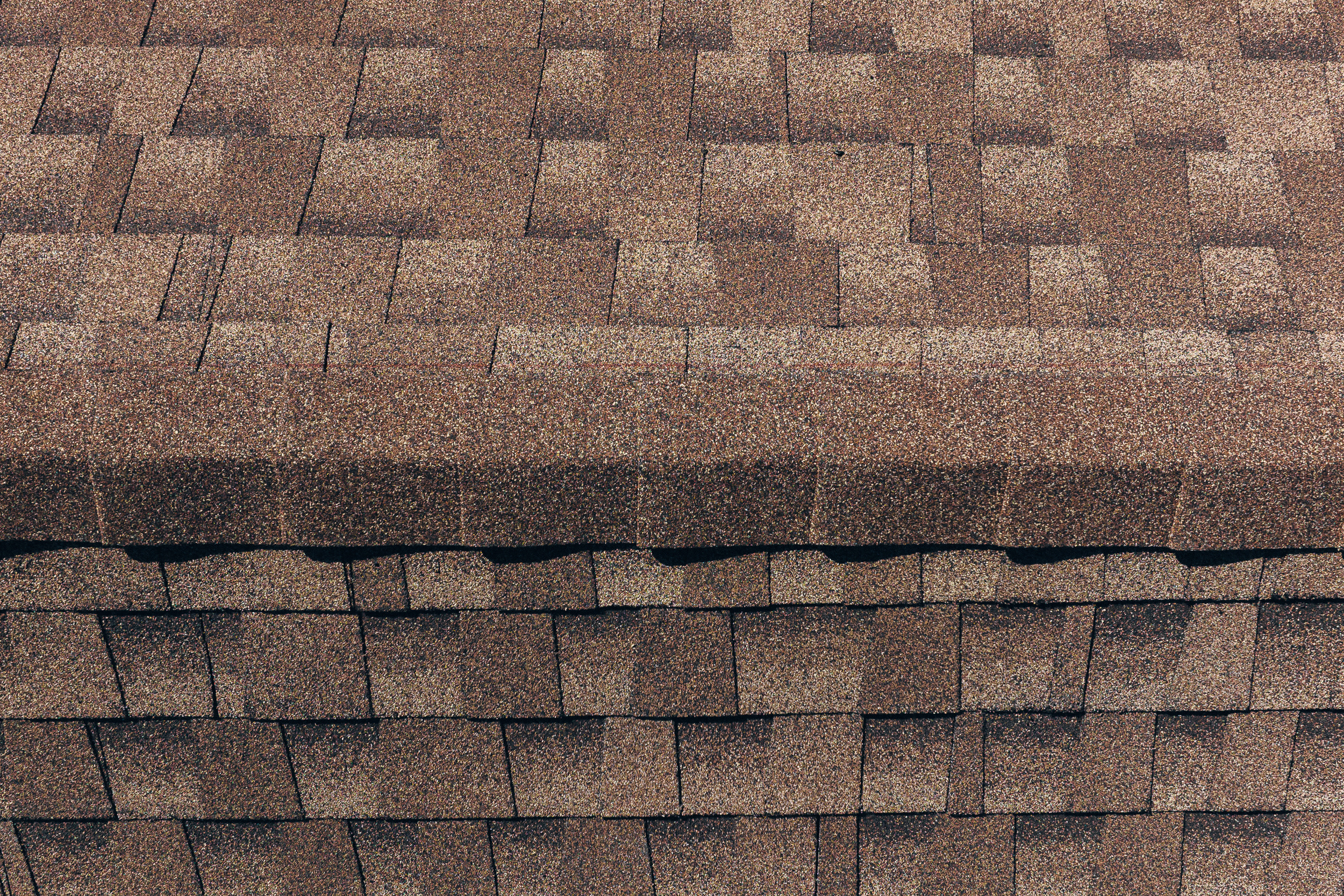 A close-up of new asphalt shingles