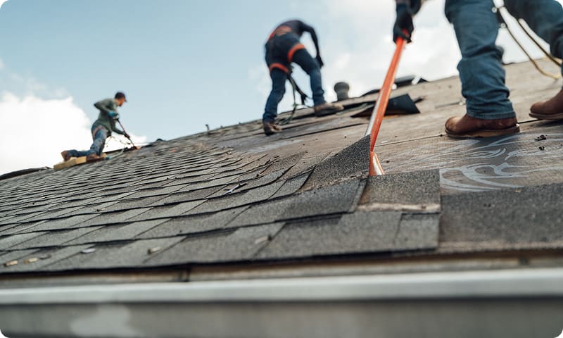 Crew completing roof work