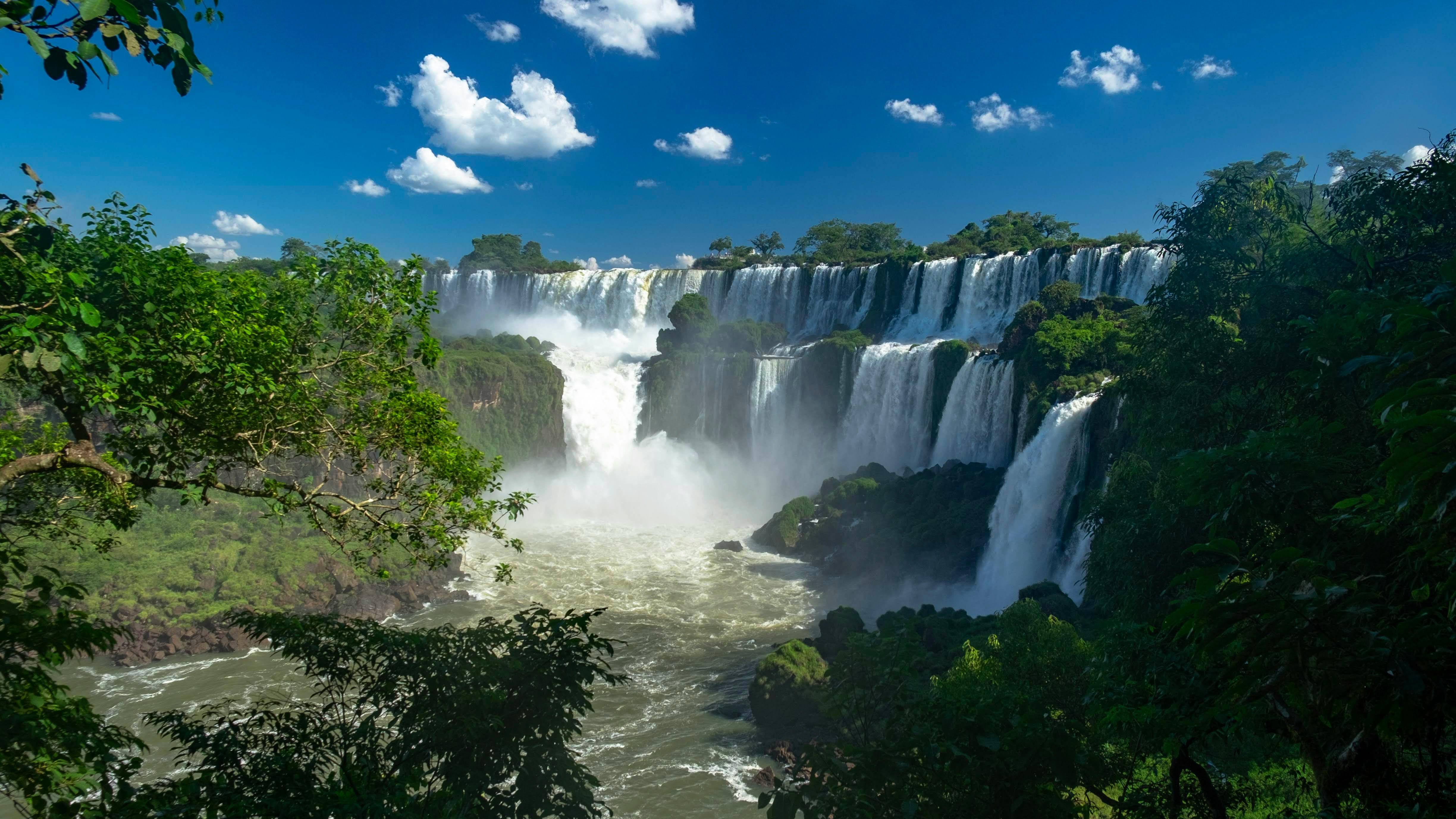 Iguazú Falls cascading through the rainforest on the Argentina-Brazil border
