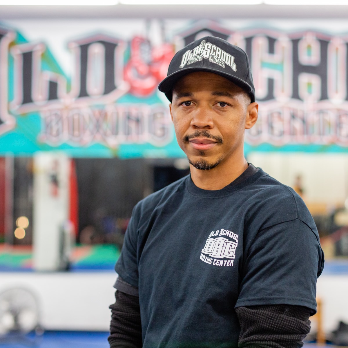 Coach Ernest Johnson (EJ) training a boxer at Old School Boxing & Fitness in San Diego