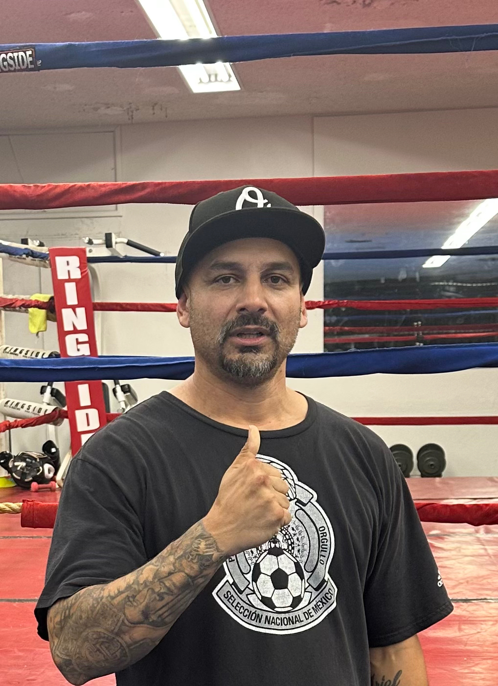 Assistant Coach Jesse Cardenas helping youth boxers at Old School Boxing & Fitness in San Diego
