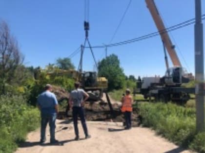 В поселке Воробьевка отремонтировали переливную дамбу