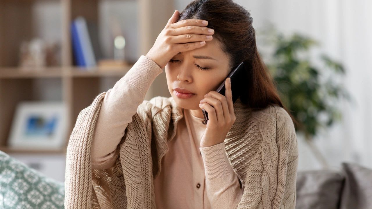 Employee sending a professional call in sick text message to a manager