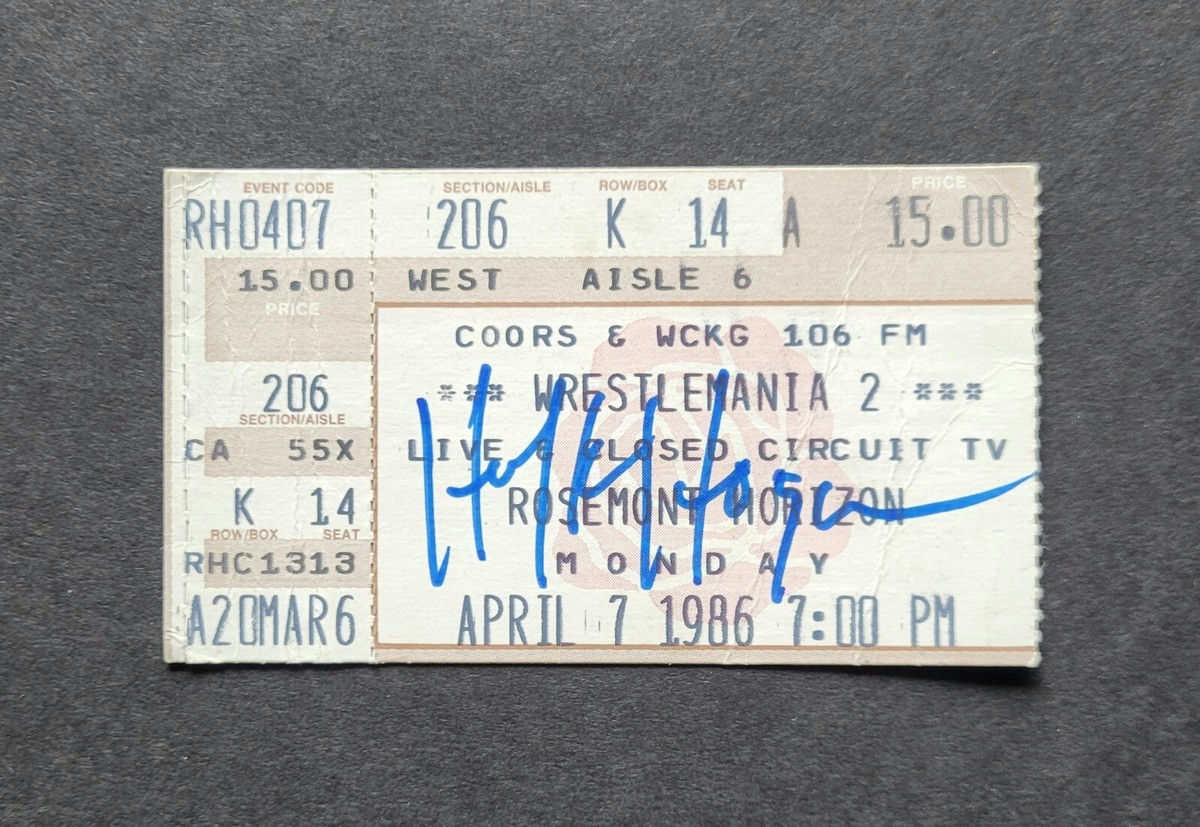Front view of 1986 WrestleMania II ticket stub signed by Hulk Hogan showing autograph and printed event details JSA authenticated wrestling memorabilia