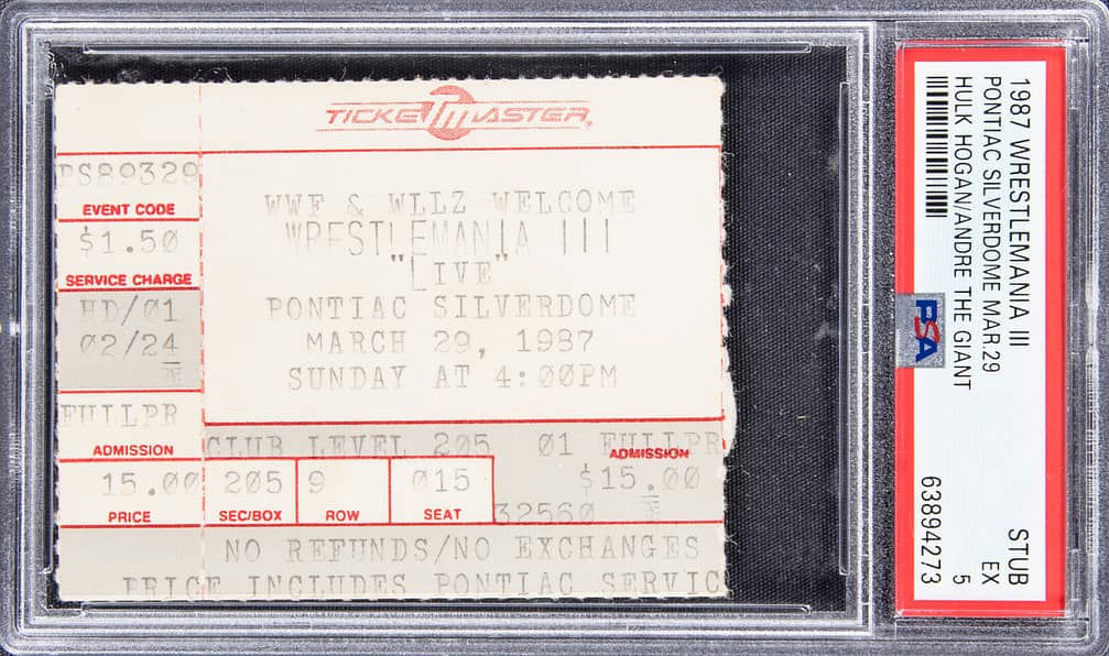 Main front view of 1987 WrestleMania III ticket stub — Hulk Hogan vs. Andre the Giant, PSA EX 5 graded collectible (Goldin Auction Lot 723) showing event title, match billing, date and printed seat/block details