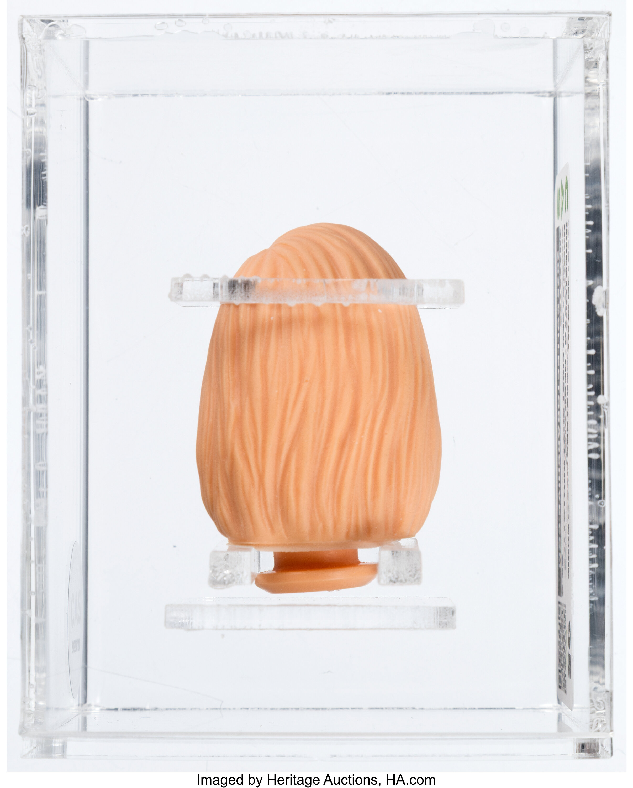 Rear view showing neck post, back-of-head sculpt and factory paint characteristics of the LJN 1987 WWF Wrestling Superstars Musclegrip Hulk Hogan first shot prototype head CAS 95