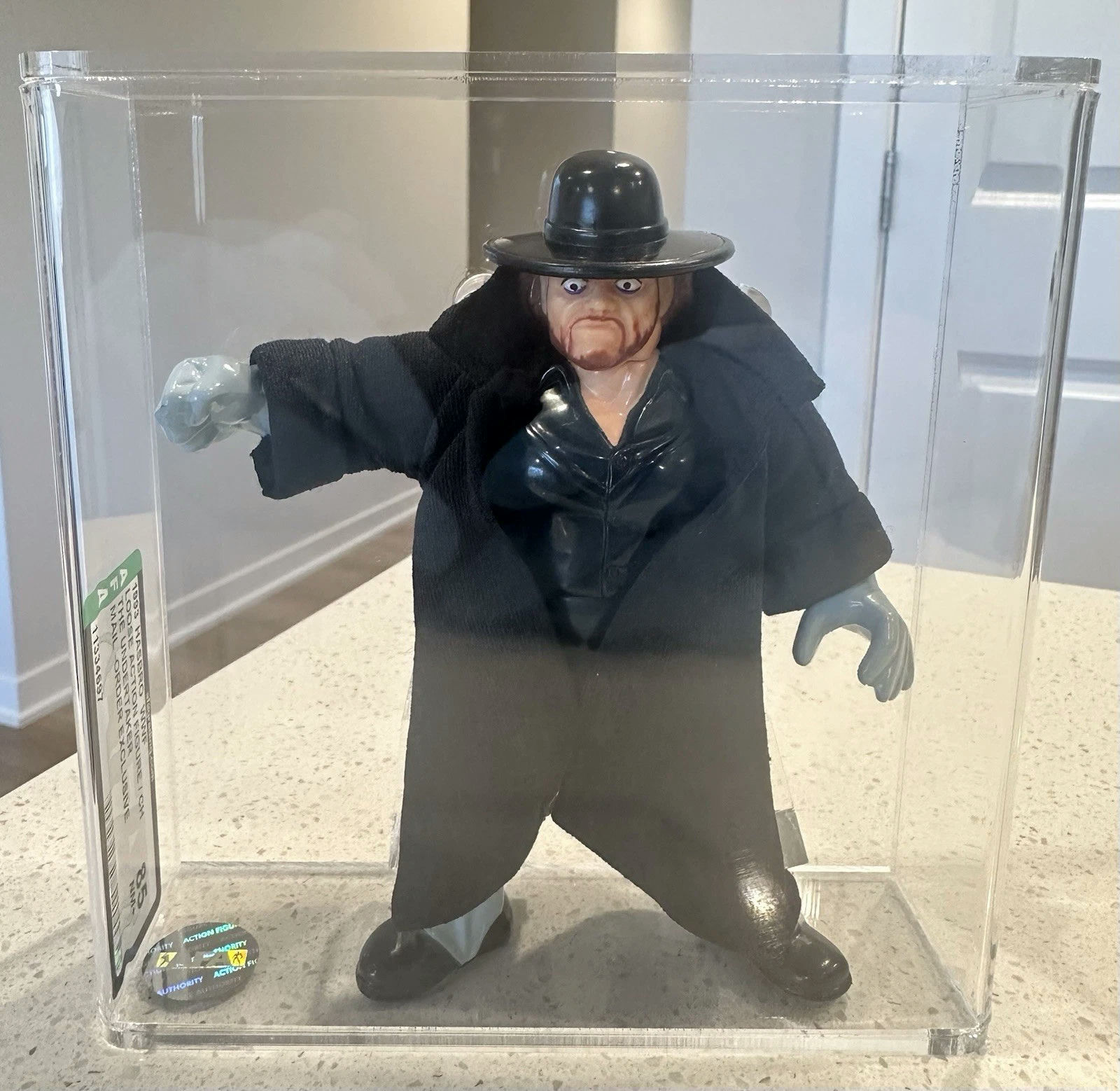 Main front view of WWF Hasbro Mail Away The Undertaker mail‑order exclusive action figure — AFA Graded 85 encapsulated grail collectible, mint sealed carded packaging with visible AFA label and bubble