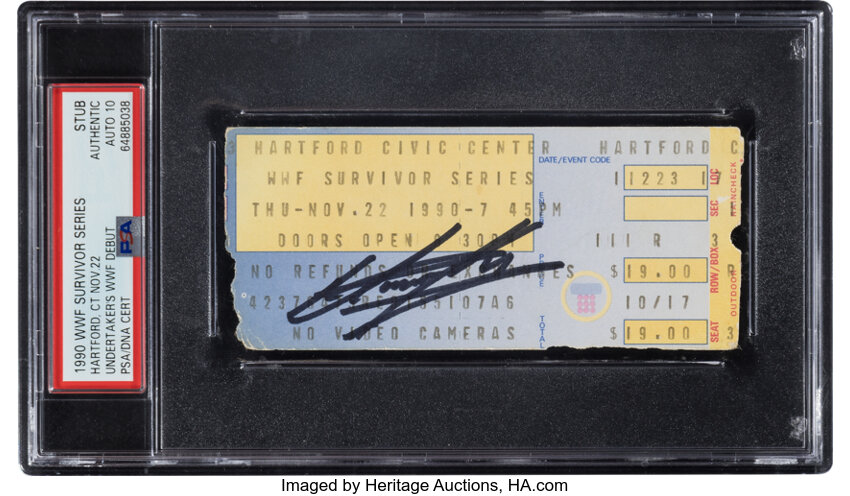 Main front view of 1990 Undertaker WWF Debut Survivor Series signed ticket stub in mint black Sharpie, PSA/DNA encapsulated with Authentic Auto 10 label, event printing and seat/venue details visible