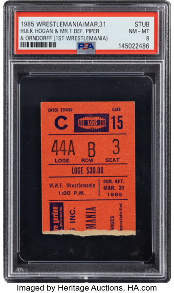 Front view of 1985 WrestleMania I ticket stub PSA NM-MT 8 Population One rare inaugural WrestleMania collectible showing PSA holder label and event text featuring Hulk Hogan Mr. T Roddy Piper Paul Orndorff Heritage auction realized $10,675 05/17/2026