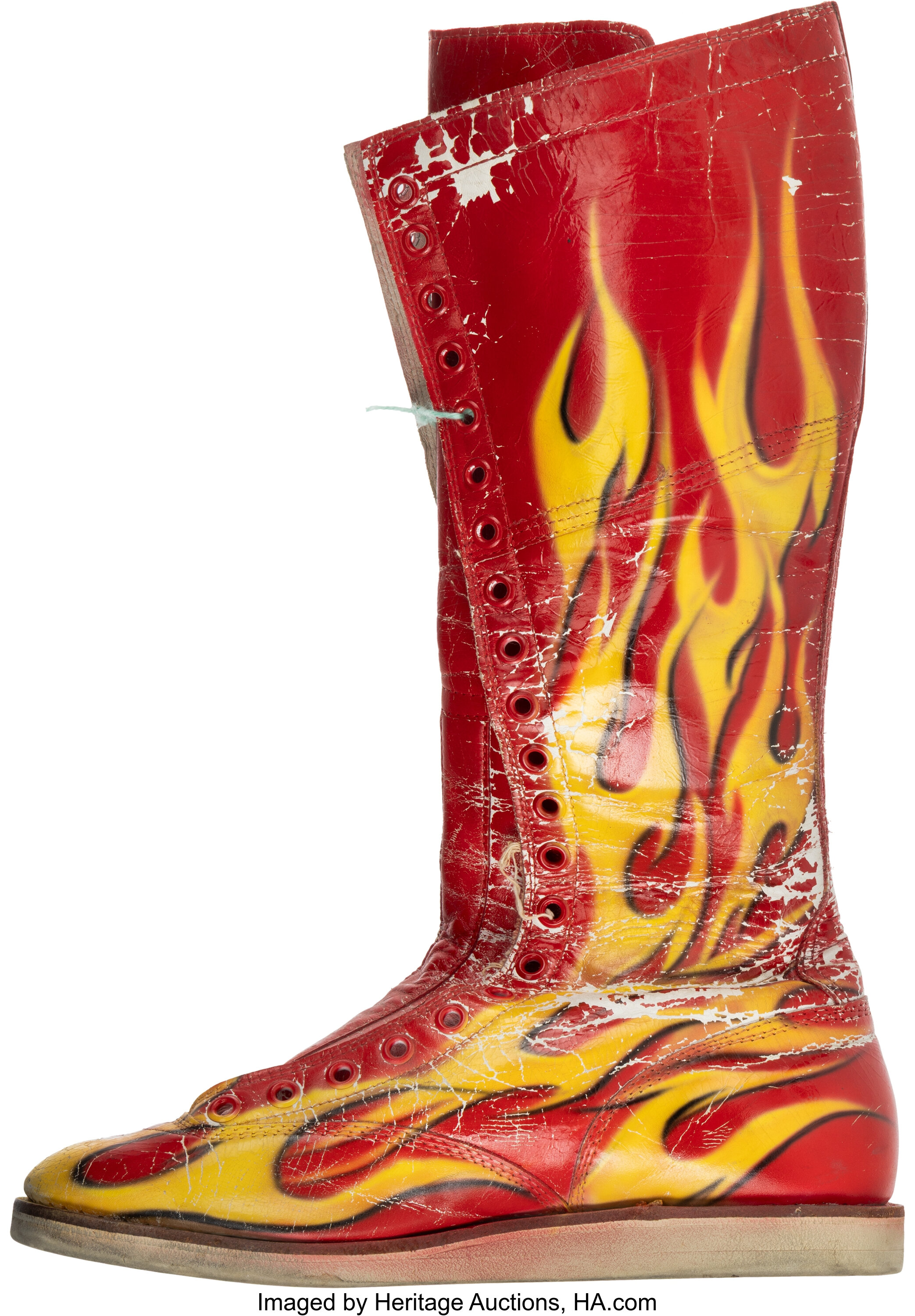 Side view of Hulk Hogan match-used boot showing in-ring wear from Hogan’s final WrestleMania appearance, photo-matched to WrestleMania XIX