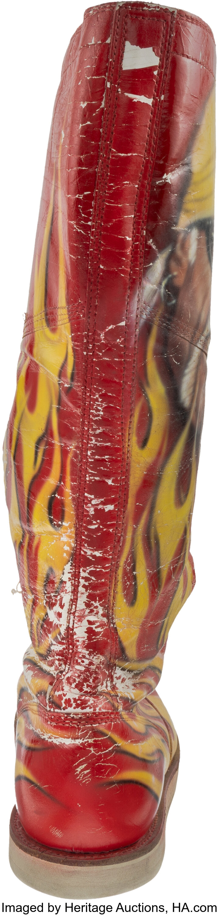 Alternate angle close-up of Hulk Hogan match-used boot revealing scuffs and arena residue consistent with event use