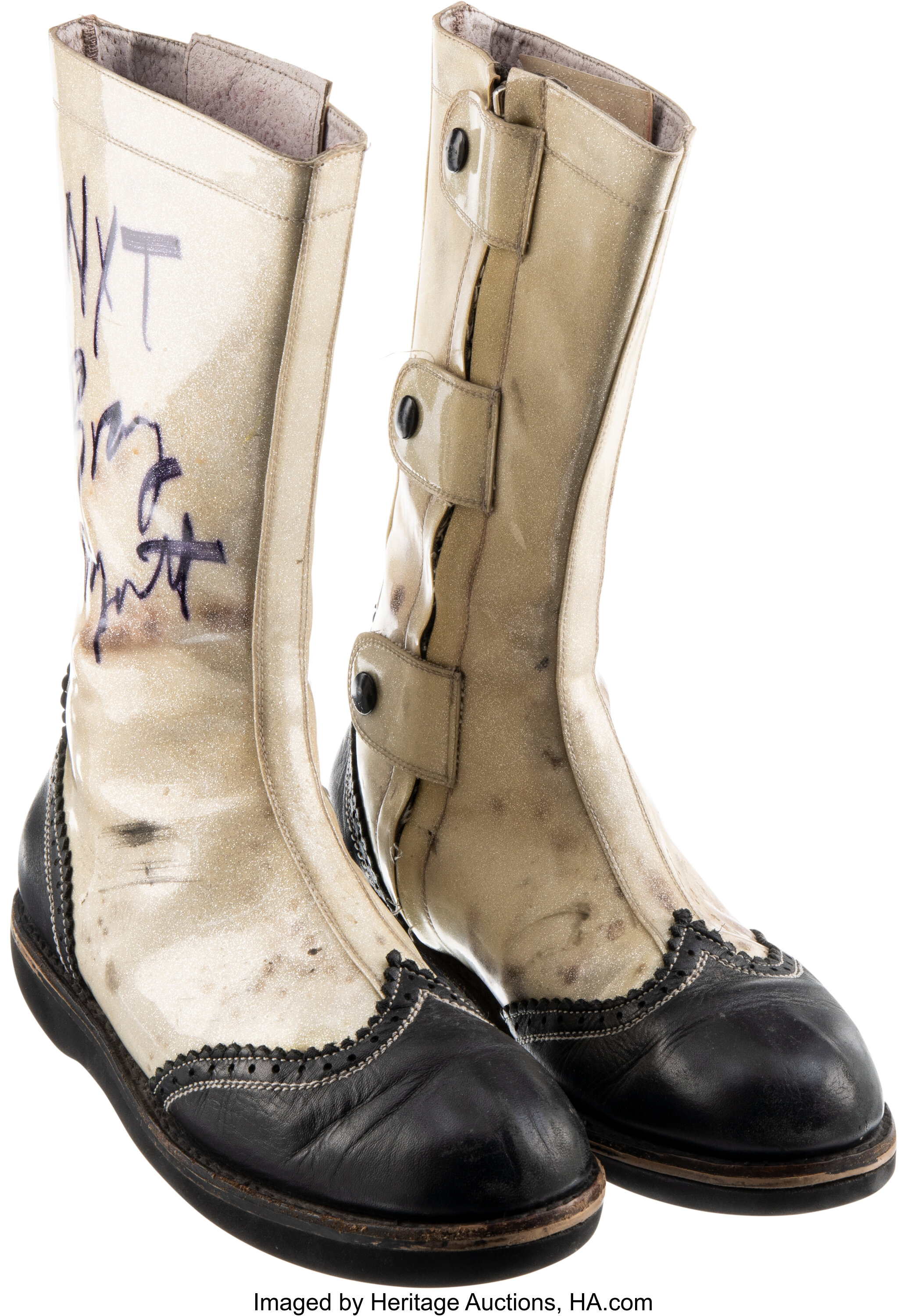 Main front view of 2010s Bray Wyatt match-worn and signed wrestling boots worn in NXT and WWE showing front profile, lacing and visible autograph