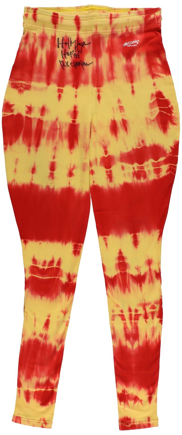Main front view of Hulk Hogan match-worn red and yellow tie-dye tights, signed and inscribed, worn April 30, 2002 defending the WWF Undisputed Championship vs. Chris Jericho with SIA Photo Match LOA and Beckett LOA