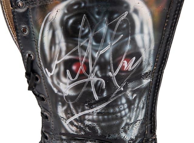 Left side profile of Dennis Rodman 1998 Bash At The Beach event-worn boots highlighting leather texture, lacing and scuff details authenticated with photo-match and JSA COA