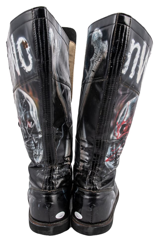Back heel and ankle detail of Dennis Rodman event-worn boots from Bash At The Beach 1998 showing heel wear and construction with accompanying JSA Certificates of Authenticity