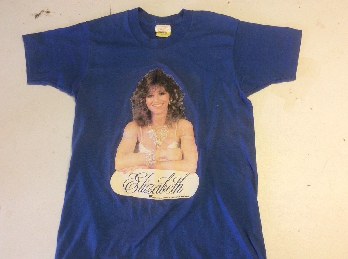 Main front view of Vintage 1988 WWF/WWE Miss Elizabeth single-stitch T-shirt Size Medium — very rare collector’s wrestling tee featuring Miss Elizabeth graphic and original single-stitch construction