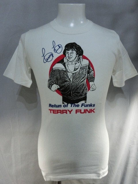 Main front view of vintage All Japan Pro Wrestling Terry Funk t-shirt size M — collectible pro wrestling tee featuring bold Terry Funk AJPW graphics, classic vintage style, ideal for WWE WWF ECW WCW memorabilia collectors