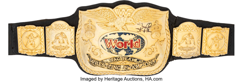 Front full view of Early 1990s World Wrestling Federation match used tag team belt signed by Stone Cold Steve Austin Reggie Parks creation with RP engraving