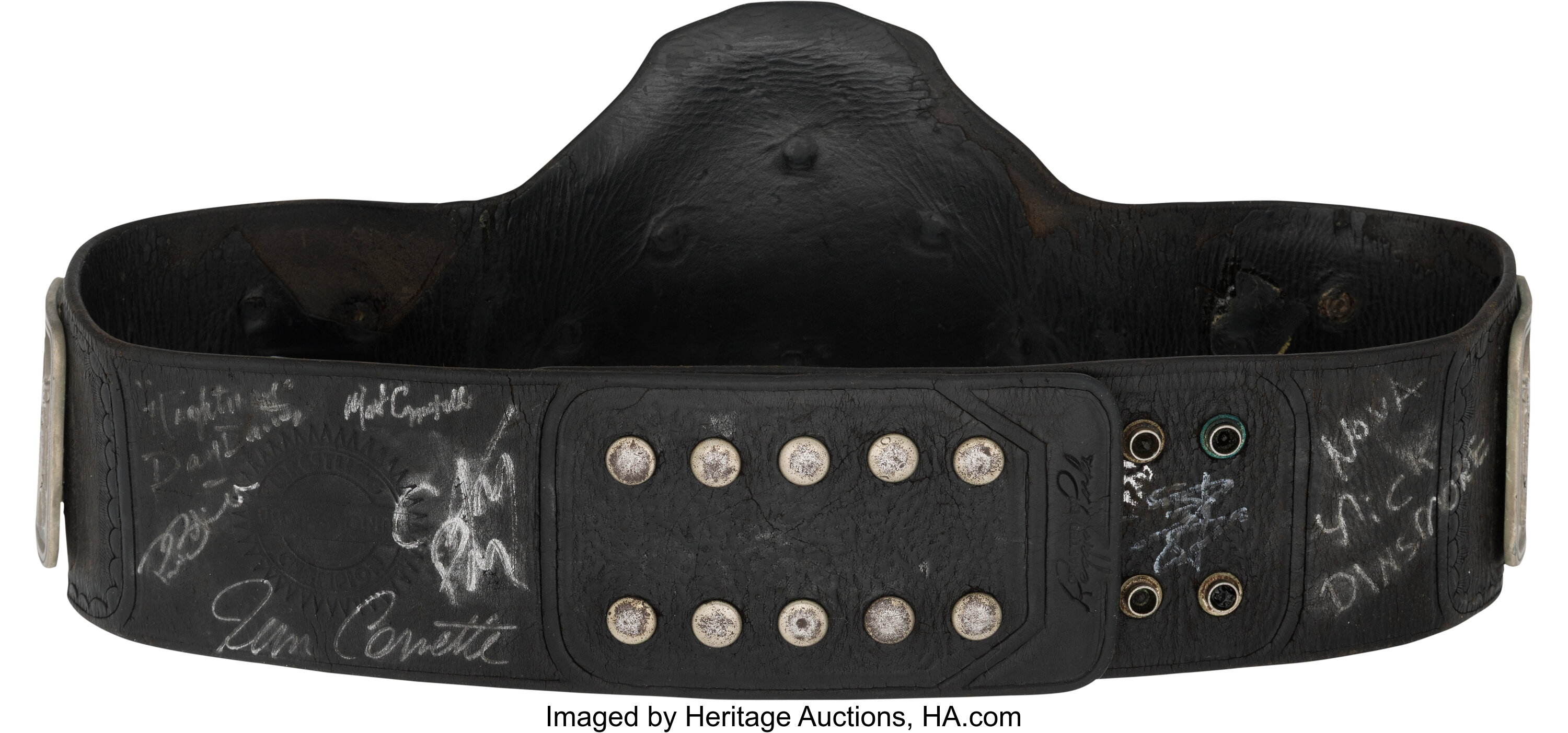 Alternate three-quarter angle of OVW Heavyweight Championship belt highlighting aged gold plates, engraved NWA-OVW text and decades of heavy use from 1997–2012