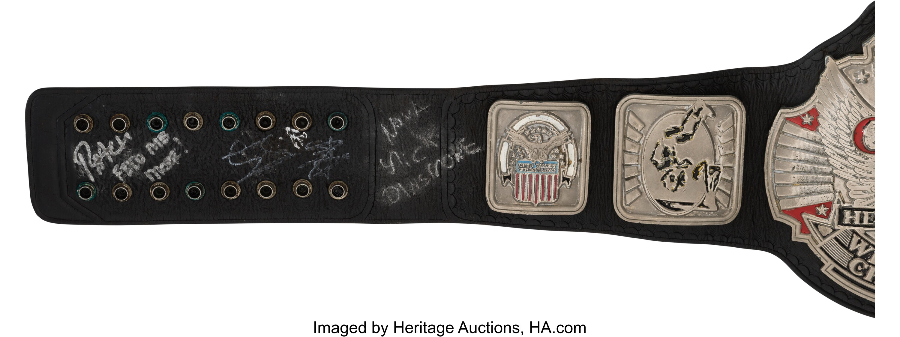 Back and interior detail of the belt showing peeled inner leather, hot glue reinforcement on a front plate and a loose end plate barely hanging from years of service