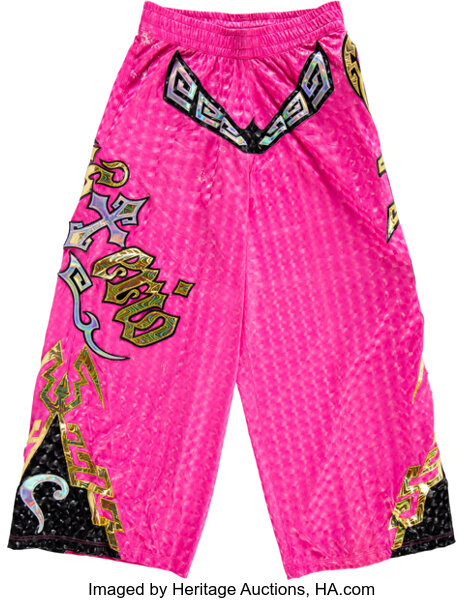 Back detail of Rey Mysterio 2012 match worn wrestling outfit highlighting rear graphics stitching and wear from in ring use