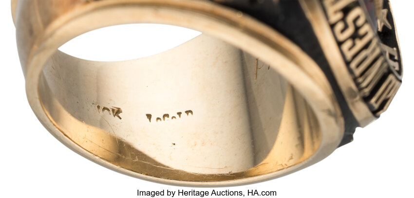 Rear and inner band view of the 1996 Pat Patterson original WWF Hall of Fame ring showing interior surface and condition