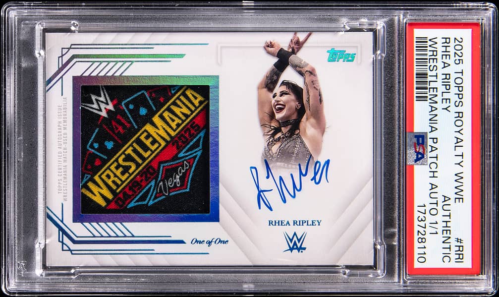 Main front view of 2025 Topps Royalty WWE WrestleMania Patch Autographs #WPA-RRI Rhea Ripley 1/1 PSA Authentic showing encapsulated on-card signature and game-used WrestleMania 41 patch with vivid Topps Royalty design