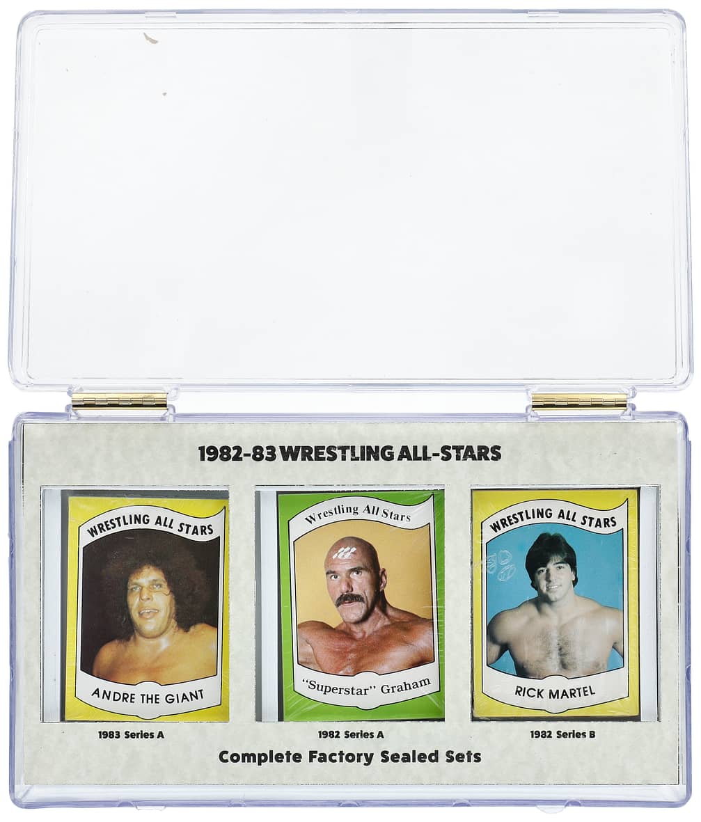 Main front view of factory-sealed 1982-83 Wrestling All-Stars complete 108-card set (1982 Series A, 1982 Series B, 1983 Series A) featuring Hulk Hogan and Andre The Giant rookie cards with original program advertisements, vintage wrestling trading card collection.