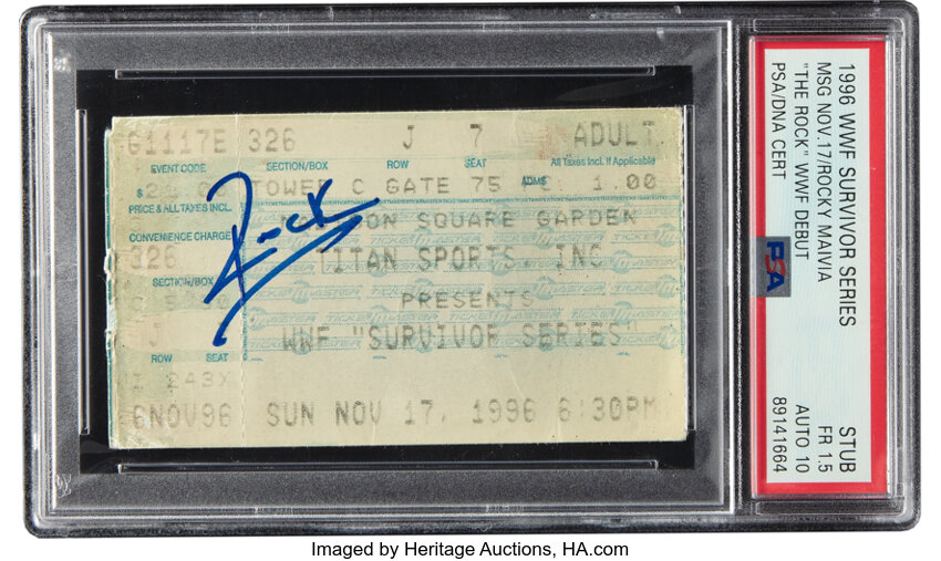 Main front view of 1996 Rocky Maivia (aka The Rock) WWF debut ticket stub — signed and PSA‑authenticated: PSA Fair 1.5 with PSA autograph 10; Population 1 (one-higher); Heritage Auction lot #12488 sold $10,980 on 09/19/2026