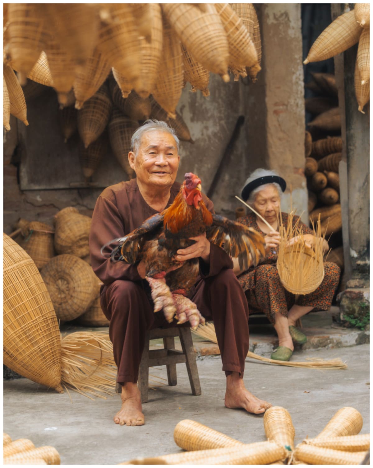 man with rooster basket weaver — Jimmy Ky