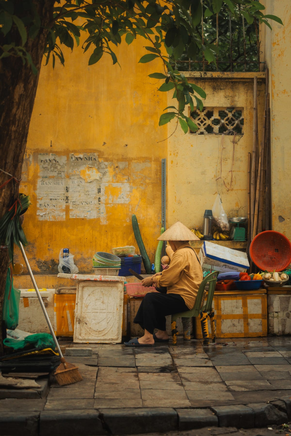 woman against yellow wall — Jimmy Ky